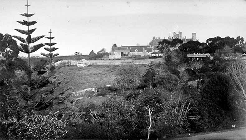 1872 Government House - view of rear of building - shows outhouses  - from the Botanical Gardens TAHO