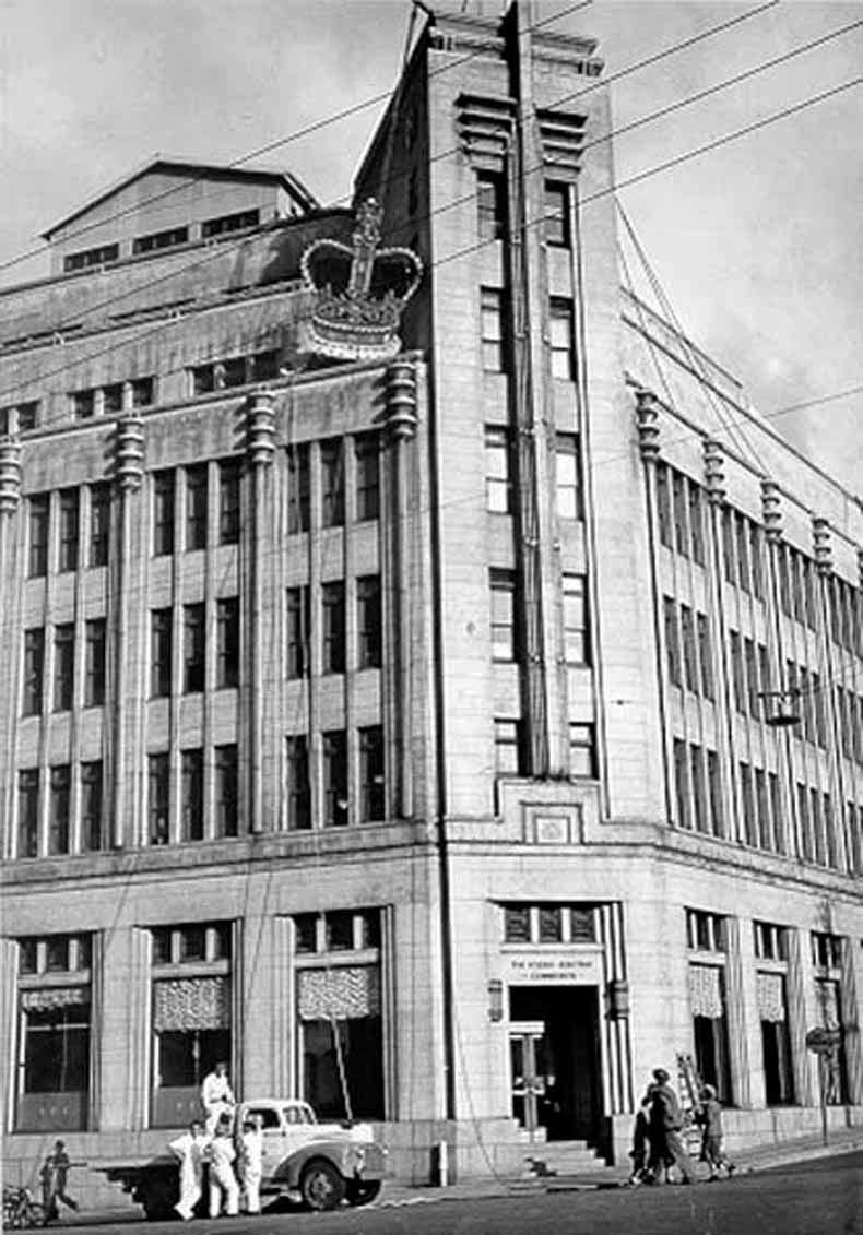 Hydro Electric Commission Building on the corner Davey and Elizabeth Streets while lifting the decorative crown onto top of building for Royal visit 1954 TAHO